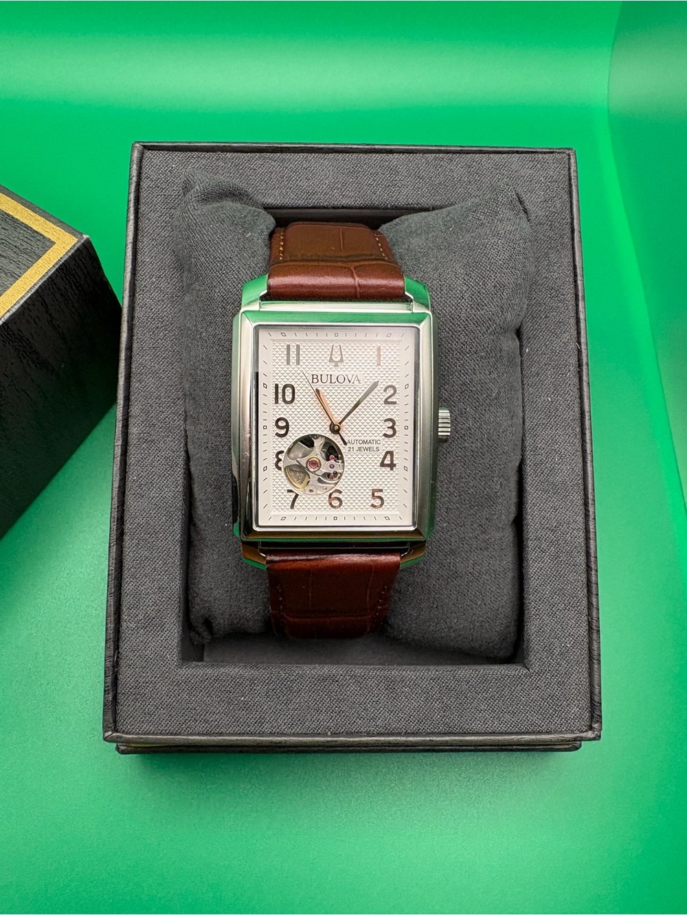 Bulova Silver Dial Watch with Brown Leather Strap and Open-Heart Window